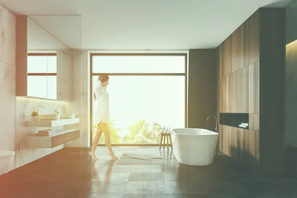 Woman in marble and wooden bathroom — Stock Photo, Image