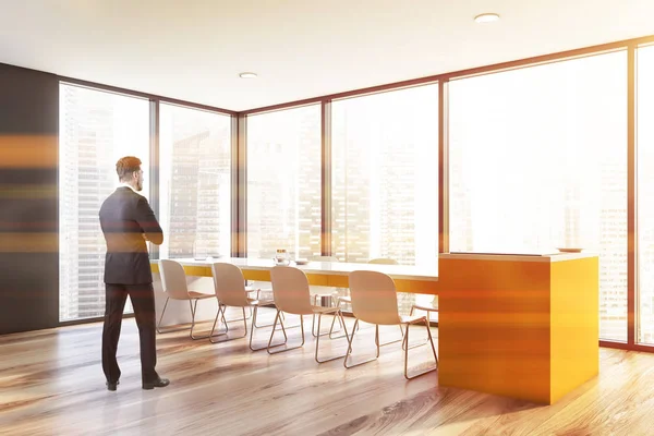 Man in gray panoramic dining room — Stock Photo, Image