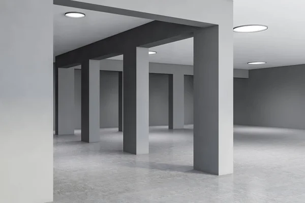 Columnas en la sala vacía del edificio gris — Foto de Stock