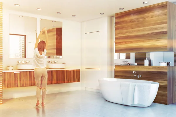 Young woman in stylish white and wood bathroom — Stock Image Young woman in stylish white and wood bathroom Stock Image