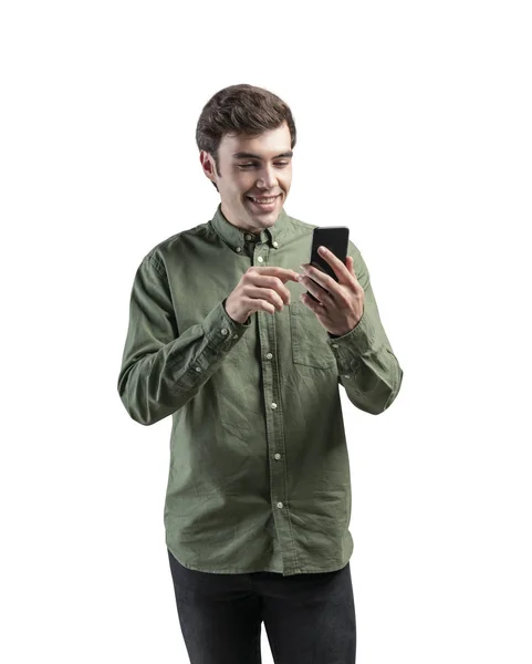 Smiling young casual man using smartphone — Stock Photo, Image