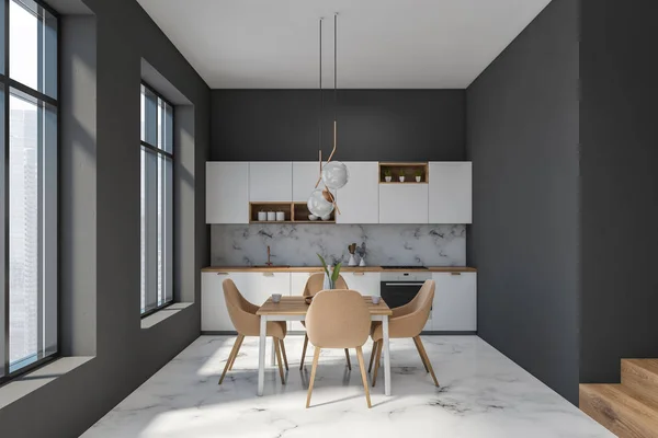 Интерьер кухни из серого и мрамора со столом — стоковое фото