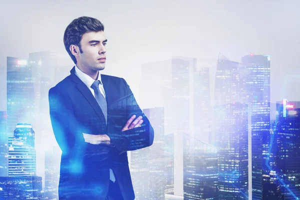 Confident pensive businessman in city — Stock Photo, Image