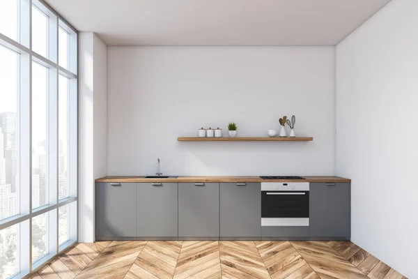 Intérieur de cuisine blanche avec comptoirs gris — Photo