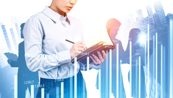 Woman writing in notebook, her team and HUD chart — Stock Photo, Image