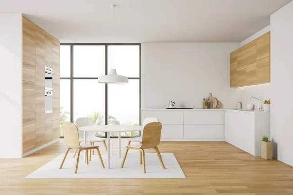 Cocina blanca y de madera con mesa comedor — Foto de Stock