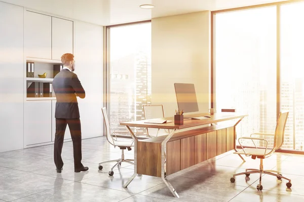 Businessman in white CEO office — Stock Photo, Image