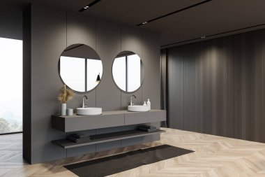 Gri ve koyu ahşap duvarları olan şık banyonun köşesi, ahşap zemin ve iki yuvarlak aynalı rahat lavabo. Bulanık dağ manzaralı bir pencere. 3d oluşturma