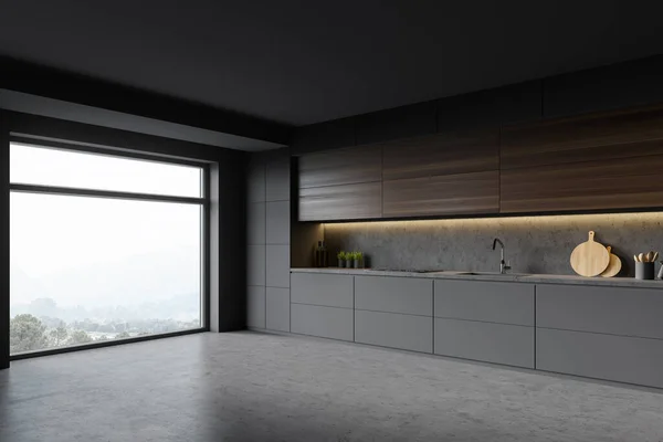 时尚厨房角落 有灰色和石墙 灰色台面 内置炊具和水槽 黑暗的木制橱柜 山景朦胧的窗户 3D渲染 — 图库照片