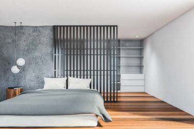 Gri ve beyaz duvarları olan şık bir çatı katı, koyu ahşap zemin, rahat kral yatağı, yuvarlak masa ve arka planda raflar. 3d oluşturma