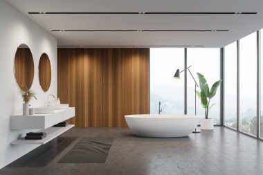 Modern banyo, beyaz ve ahşap duvarlar, beton zemin, pencerenin yanında duran rahat küvet dağ manzaralı ve çift lavabolu yuvarlak aynalar. 3d oluşturma