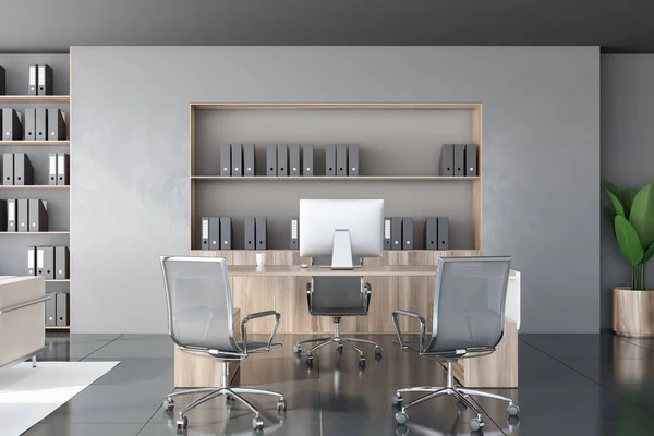 Interior of modern CEO office with grey walls, tiled floor, wooden computer table with chairs for visitors and bookcases with folders. 3d rendering