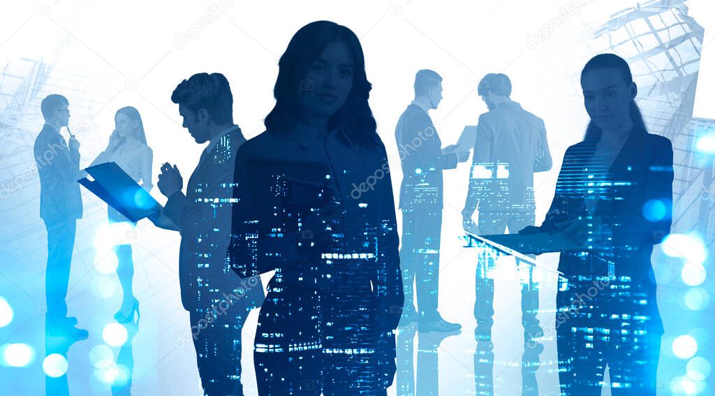 Silhouettes of business team members working together in blurry night city. Concept of teamwork and corporate lifestyle. Toned image double exposure