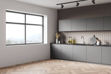 Modern mutfağın köşesinde beyaz ve bej fayans duvarlar, ahşap zemin, gri dolaplar ve mutfak tezgahları var. Bulanık dağ manzaralı bir pencere. 3d oluşturma