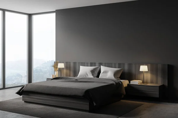 Corner of stylish master bedroom with gray walls, concrete floor, comfortable king size bed and window with blurry mountain view. 3d rendering