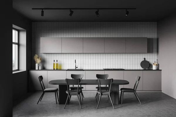 グレーと白のタイルの壁 コンクリートの床 グレーのカウンターと食器棚とダイニングテーブルとスタイリッシュなキッチンのインテリア 3Dレンダリング — ストック写真