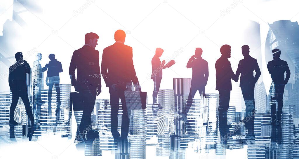 Silhouettes of diverse businessmen working together in abstract blurry city. Concept of teamwork and communication. Toned image double exposure