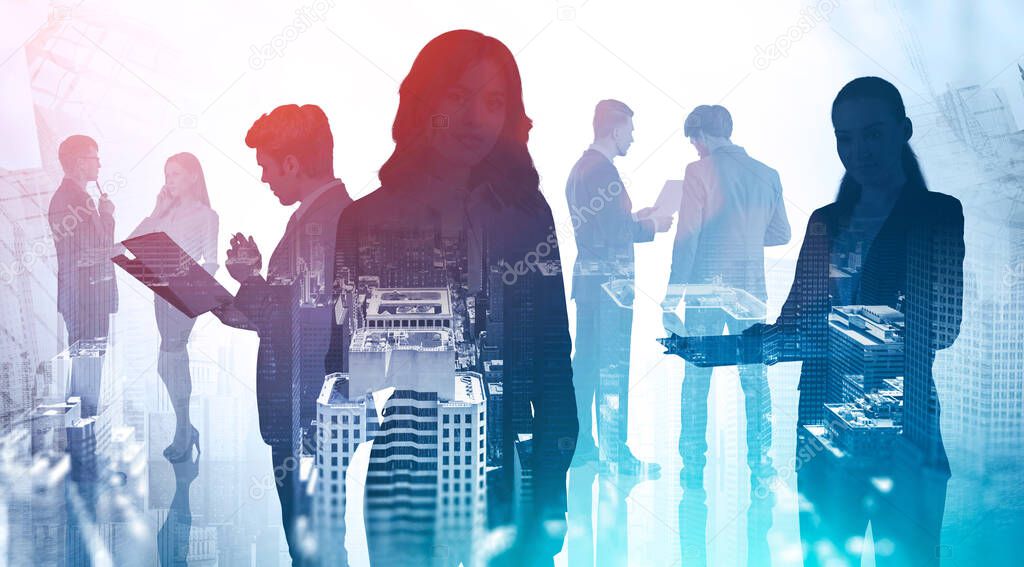 Silhouettes of business team members working together in blurry abstract city. Concept of teamwork and corporate lifestyle. Toned image double exposure