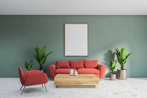 Interior of bright living room with green walls, concrete floor, red sofa and armchair standing near wooden coffee table. Vertical mock up poster. 3d rendering