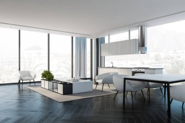 Modern mutfak ve yemek odasının köşesinde beyaz duvarlar, siyah ahşap zemin, beyaz tezgah ve dolaplar, oturma odası, koltuklar ve yemek masası. Bulanık şehir manzarası. 3d oluşturma