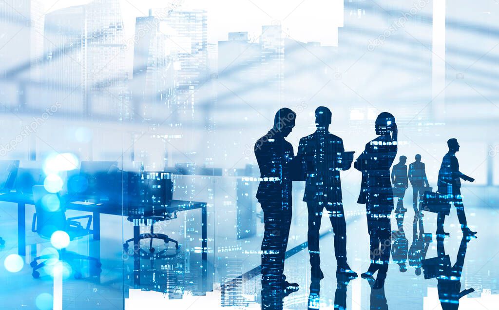 Silhouettes of business people working in corporate office with double exposure of blurry night cityscape. Concept of teamwork and business meeting. Toned image