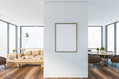 Modern oturma odasının içinde, yanında kahverengi koltuklar ve yuvarlak masa olan kahve masasının ve yemek odasının yanında duran bej renkli rahat bir kanepe. Bulanık şehir manzarası ve sahte poster. 3d oluşturma