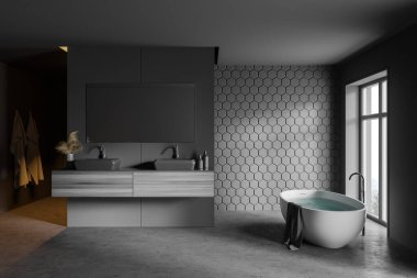 Gri bal peteği duvarları, beton zemini, rahat küveti ve yatay aynalı çift lavabosu olan şık bir banyo. Bulanık dağ manzaralı bir pencere. 3d oluşturma