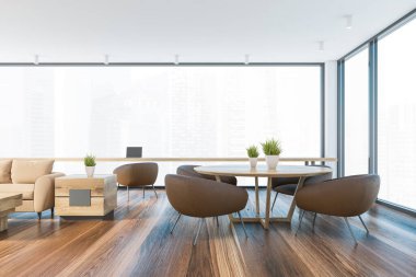 Geniş oturma odasının içinde bej kanepe, kahve masası, kahverengi koltuklu yuvarlak yemek masası ve şehir manzarası bulanık pencere kenarındaki ofis alanı. 3d oluşturma