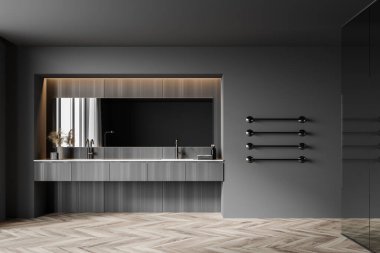 Gri ve ahşap duvarları, ahşap zemini ve büyük aynalı rahat çift lavabosu olan şık bir banyo. 3d oluşturma