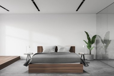 Beyaz ve cam duvarları, beton zemini ve yuvarlak komodinli rahat kral yatağı olan modern ana yatak odasının içi. 3d oluşturma