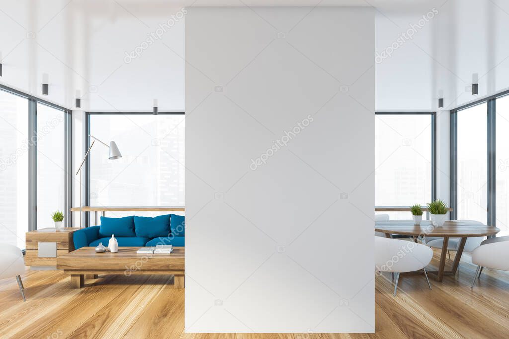 Interior of stylish living room with white walls, comfortable blue sofa standing near coffee table and dining room with round table and white armchairs next to it. Blurry cityscape. 3d rendering
