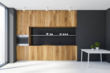 Siyah duvarları olan şık bir mutfak, ahşap zemin, koyu ahşap tezgah, sehpa ve bulanık şehir manzaralı bir pencere. 3d oluşturma