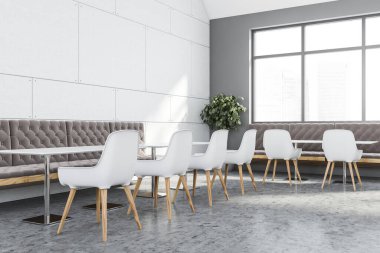 Beyaz ve gri duvarları olan şık bir restoranın köşesi, beton zemin, sandalyeli uzun beyaz masalar ve rahat kahverengi koltuklar. Bulanık şehir manzaralı bir pencere. 3d oluşturma
