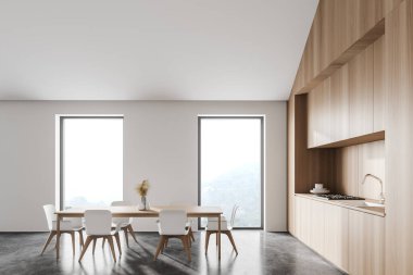 Beyaz ve ahşap duvarlı modern tavan arası mutfağı, beton zemin, ahşap tezgah ve beyaz sandalyeli yemek masası. Bulanık dağ manzaralı pencereler. 3d oluşturma