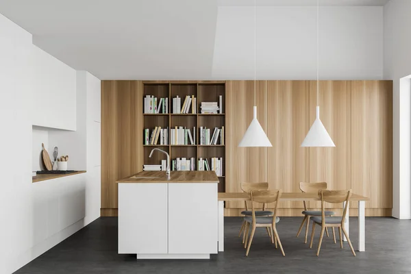 现代化厨房的内部 有白色和木制墙壁 混凝土地面 白色台面 舒适的岛屿 餐桌和书柜 3D渲染 — 图库照片