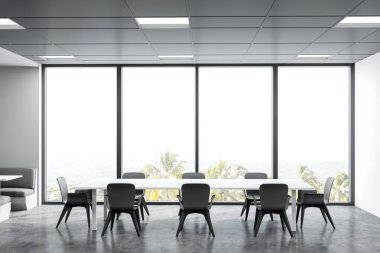 Beyaz duvarları, beton zemini, gri sandalyeli beyaz masaları ve yumuşak koltukları olan şık bir kafeterya. Bulanık tropikal manzaralı bir pencere. 3d oluşturma