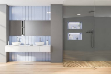 Modern banyonun içinde mavi fayanslar ve gri duvarlar, ahşap zemin, rahat çift lavabo, yatay ayna ve duş kabini. 3d oluşturma