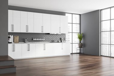 Gri tuğlalı duvarları, ahşap zemini, beyaz dolapları ve dolapları olan şık bir mutfağın köşesi. Merdivenler ve bulanık şehir manzarası. 3d oluşturma