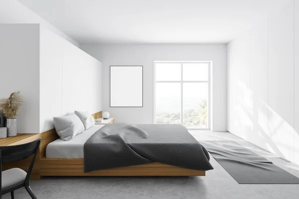 Side view of master bedroom with white walls, concrete floor, comfortable king size bed, window with blurry mountain view and vertical mock up poster. 3d rendering