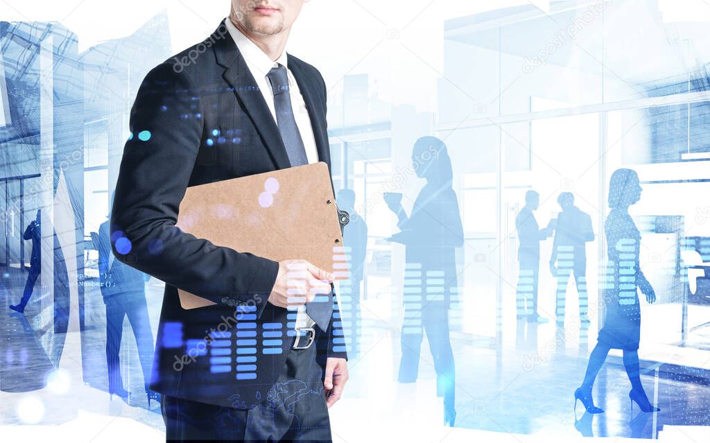 Unrecognizable young businessman holding clipboard in blurry office with double exposure of financial graph and business people. Concept of trading. Toned image