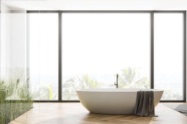 Camdan duvarları, ahşap zemini, rahat küveti ve bulanık tropikal manzaralı panoramik banyonun ön manzarası. 3d oluşturma