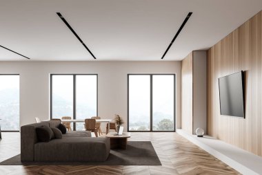 Modern mutfak ve oturma odasının içinde beyaz ve ahşap duvarlar, ahşap zemin, yemek masası ve televizyonlu kanepe. 3d oluşturma