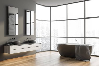 Gri duvarlı panoramik banyonun köşesi, ahşap zemin, rahat küvet ve aynalı çift lavabo. 3d oluşturma