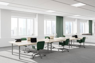 Modern açık uzay ofis köşesinde beyaz duvarları ve halılı zemini olan bilgisayar masaları. 3d oluşturma