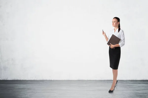 Full Length Portrait Serious Young European Businesswoman Folder Pen Standing — Stock Photo, Image