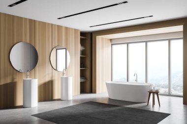 Modern banyonun köşesinde beyaz ve ahşap duvarlar, beton zemin, rahat küvet ve yuvarlak aynalı çift lavabo. 3d oluşturma