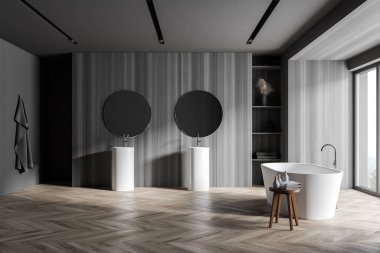 Gri ve ahşap duvarları olan şık bir banyo manzarası, ahşap zemin, rahat bir küvet ve yuvarlak aynalı çift lavabo. 3d oluşturma