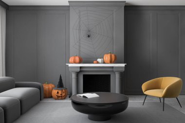 Gri duvarları, beton zemini, gri kanepesi ve sehpanın yanındaki koltuğu ve şömineye oyulmuş balkabakları olan modern oturma odasının içi. Cadılar Bayramı kavramı. 3d oluşturma