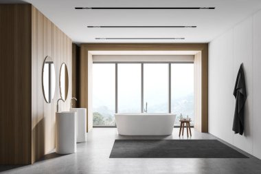 Modern banyo, beyaz ve ahşap duvarlar, beton zemin, rahat küvet ve yuvarlak aynalı çift lavabo. 3d oluşturma