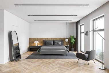 Beyaz ve ahşap duvarları, ahşap zemini, rahat kral yatağı ve koltuğu olan modern yatak odasının içi. 3d oluşturma